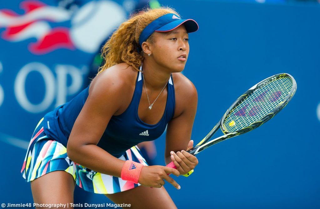 Pretty mixed asian black tennis player