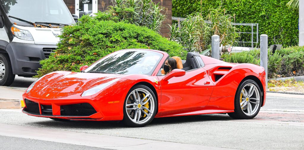 Driving her ferrari car